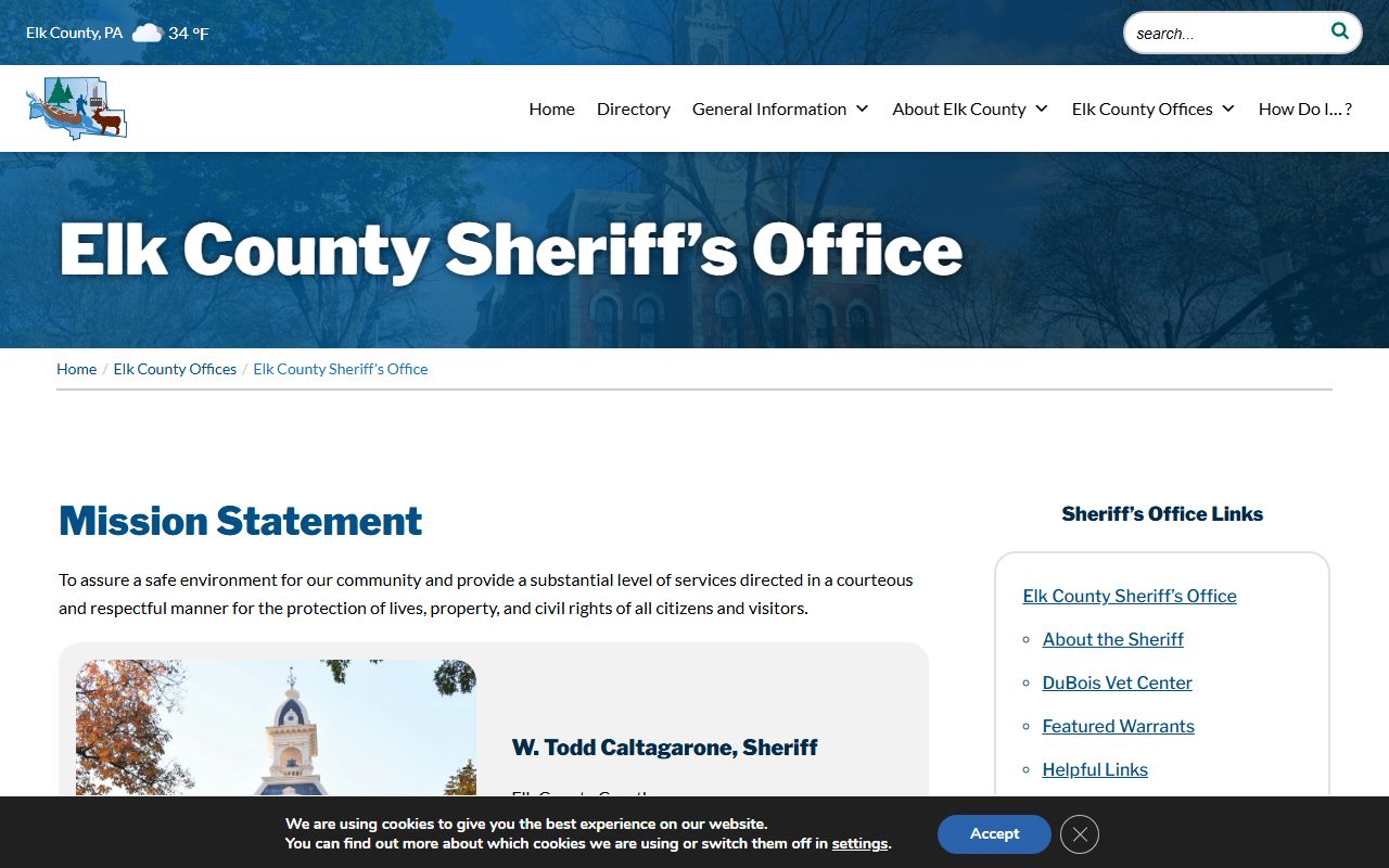 Elk County Sheriff's Office website showing services and warrant information for Elk County